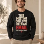 Man wearing black This Meeting Could’ve Been an Email crewneck sweatshirt